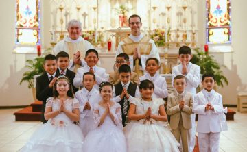 Photos from First Communion Masses!